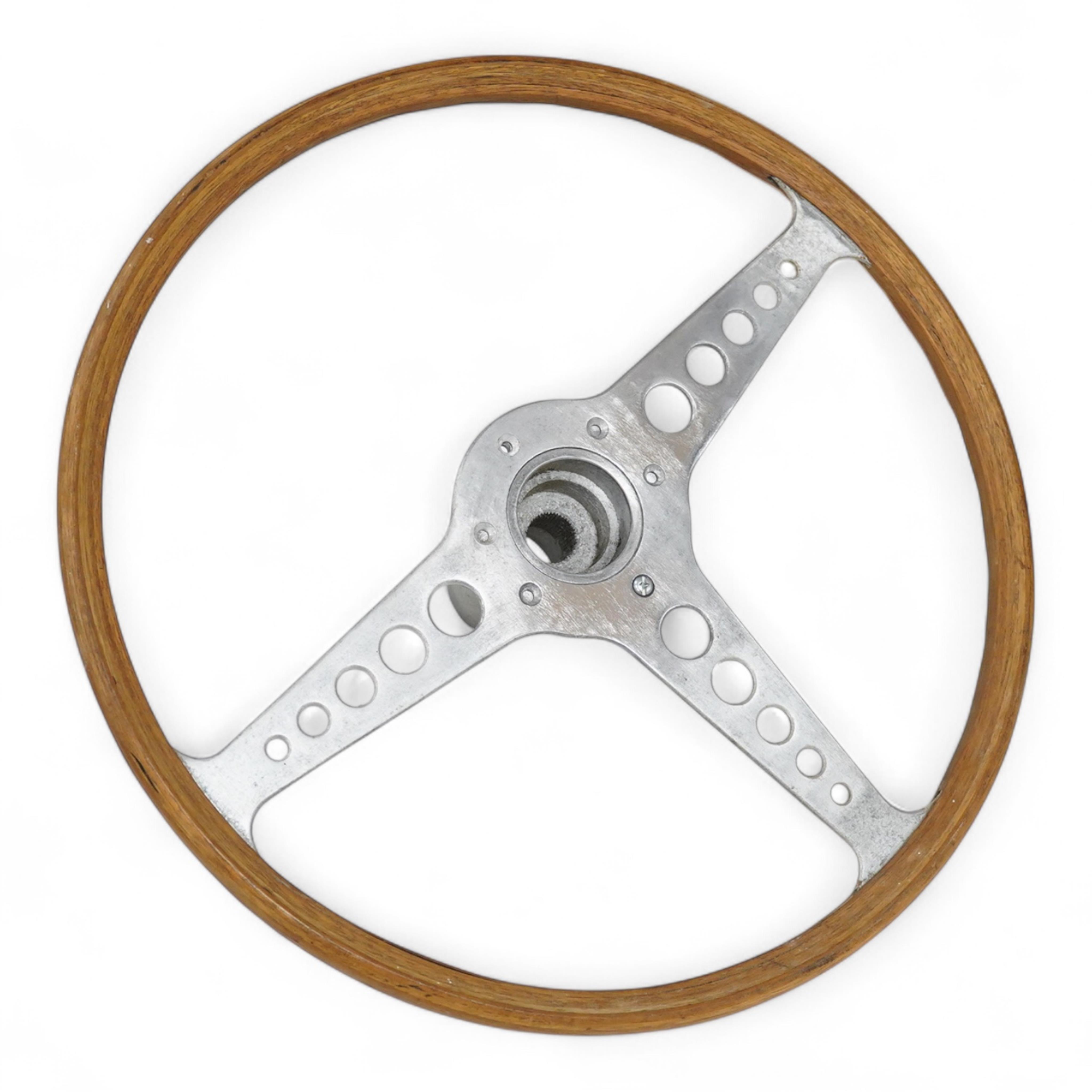 A Jaguar E Type steering wheel in wood and steel, together with the top section of the steering column which bolts to the steering wheel, missing the central Jaguar emblem, 41cm diameter